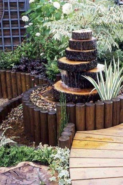 jardim rústico fonte de tronco