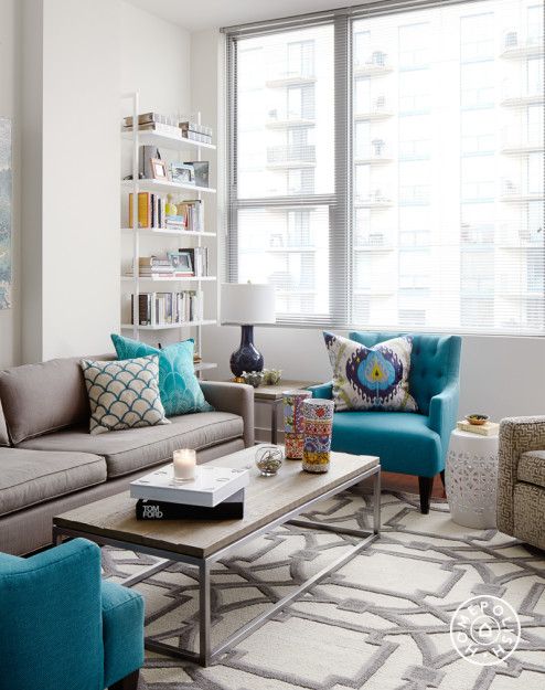 salas com sofá cinza apartamento