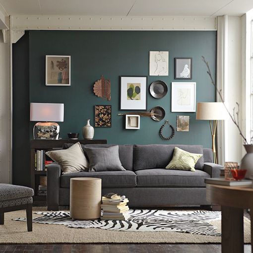 salas com sofá cinza parede e tapete