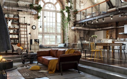 Sala com sofá de couro, piso de cimento queimado, tudo em estilo industrial.