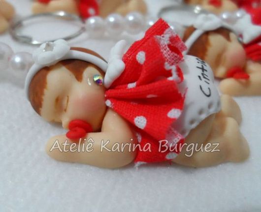Bebê de biscuit para menina com vestido vermelho