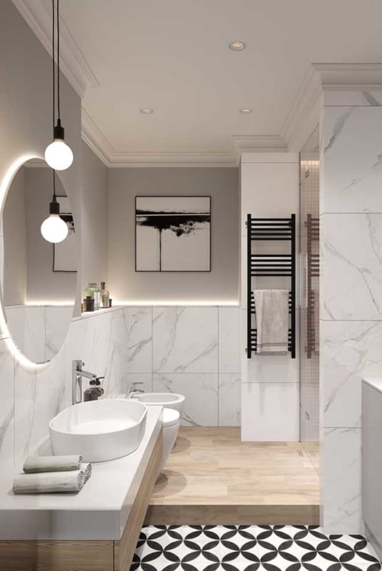 Banheiro com cerâmica que imita mármore na parede