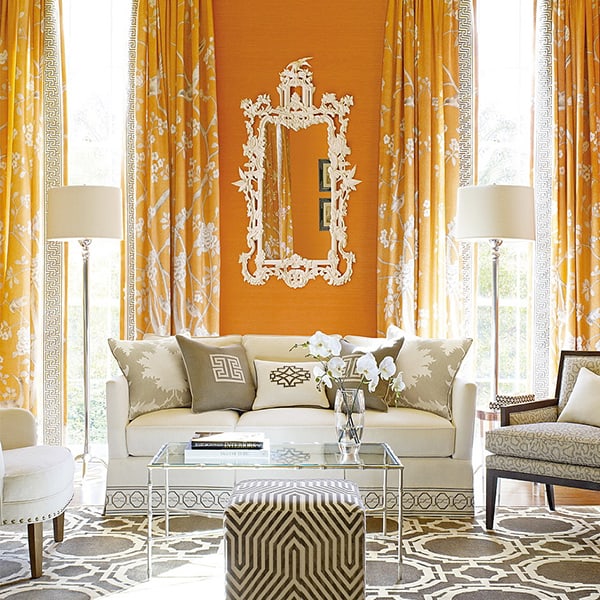 Decoração clássica para sala com cor laranja