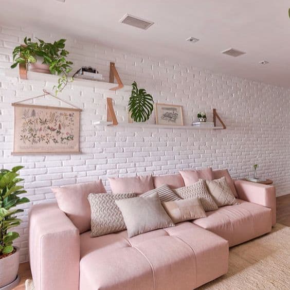 sala com sofa rosa pastel