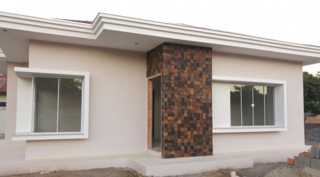 fachada de casa com pedra decorativa