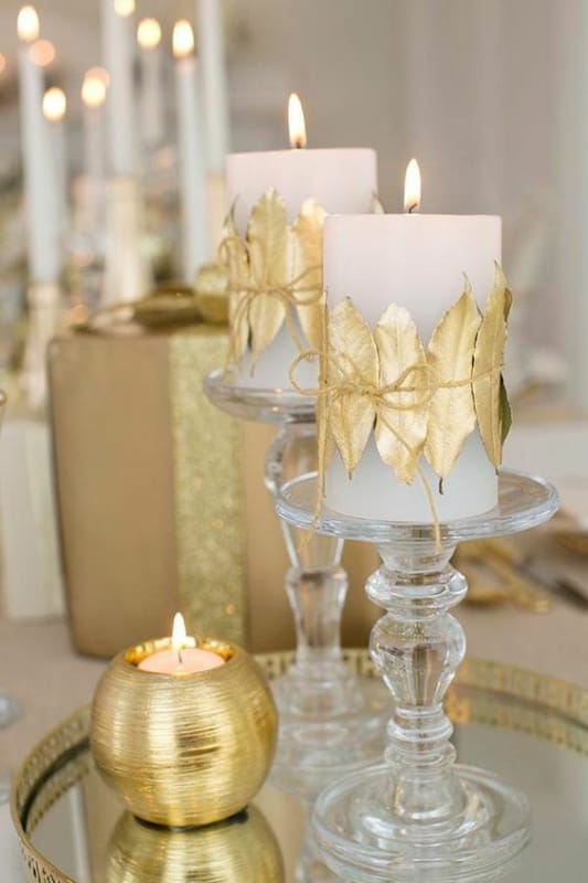 23 arranjo de mesa dourado com velas