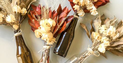 garrafas com flores secas para decoracao