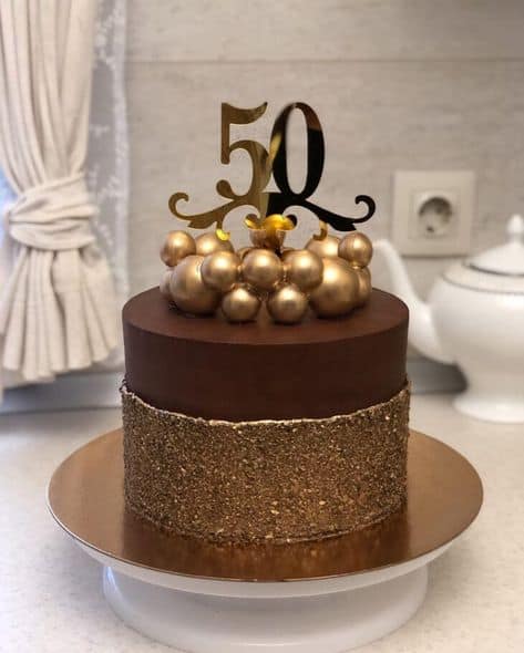 bolo masculino 50 anos chocolate