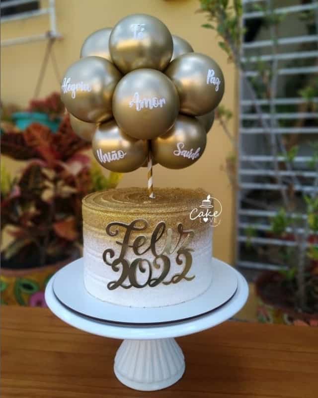 27 balloon cake dourado @caake love