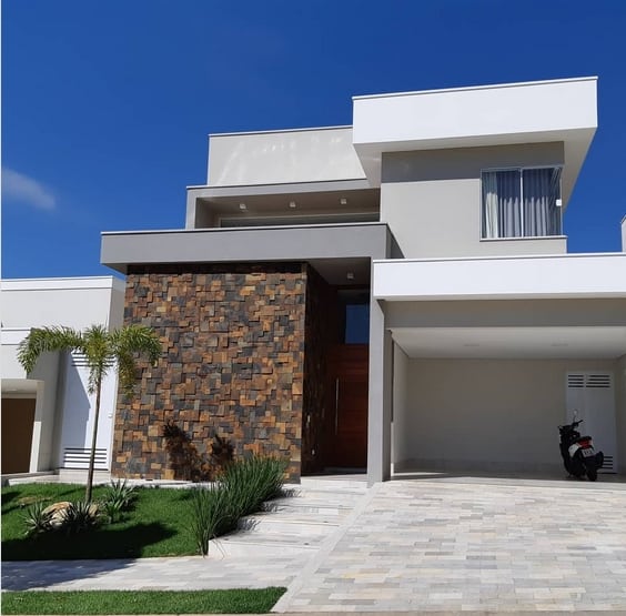 47 casa moderna com pedra ferro @daniele galante arquitetura