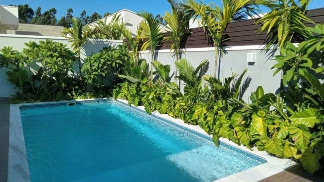 34 piscina com paisagismo residencial @ljspaisagismocatalao